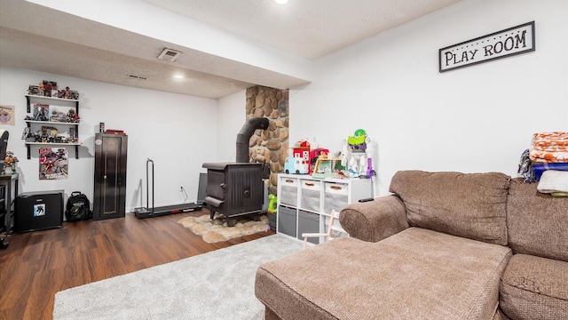 650 Licking View Dr, Heath, OH 43056 - living area with a wood stove, dark wood-style flooring, and recessed lighting