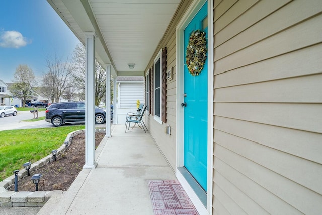 property entrance featuring covered porch