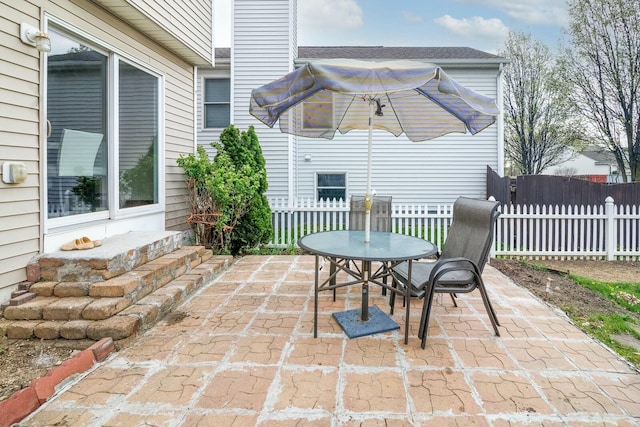 view of patio / terrace with fence and outdoor dining space