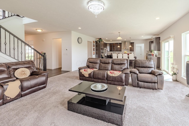 9295 Dewitt Dr, Plain City, OH 43064 - living area featuring recessed lighting, carpet flooring, baseboards, and stairway