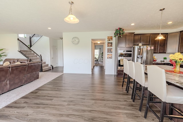 9295 Dewitt Dr, Plain City, OH 43064 - interior space with dark wood-type flooring, recessed lighting, and stairs
