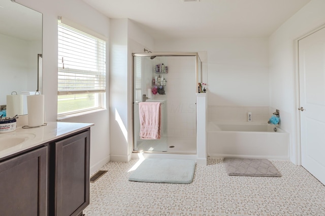 9295 Dewitt Dr, Plain City, OH 43064 - full bathroom featuring plenty of natural light, a shower stall, and a bath