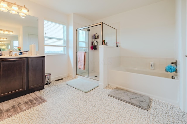 9295 Dewitt Dr, Plain City, OH 43064 - full bathroom featuring vanity, a stall shower, a bath, and visible vents