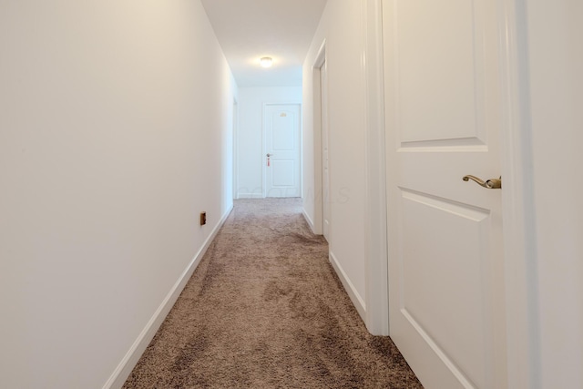 9295 Dewitt Dr, Plain City, OH 43064 - hallway featuring baseboards and light carpet