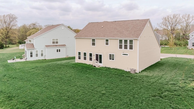 9295 Dewitt Dr, Plain City, OH 43064 - back of property with roof with shingles and a yard