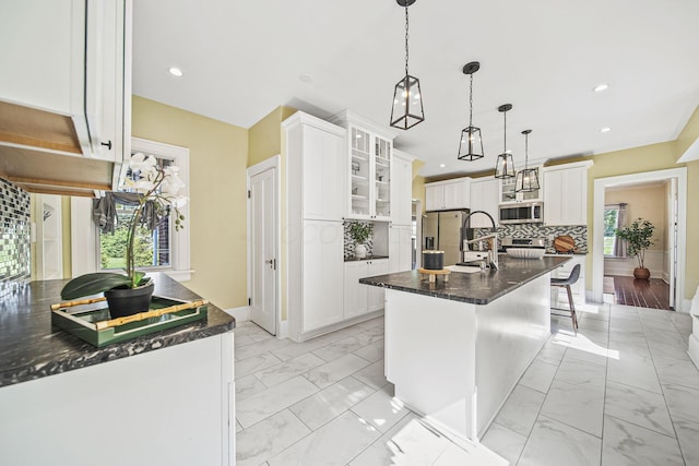 1812 Newark Granville Rd, Granville, OH 43023 - kitchen with stainless steel appliances, light marble finish flooring, baseboards, and recessed lighting