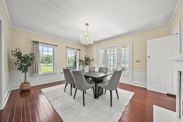 1812 Newark Granville Rd, Granville, OH 43023 - dining room with a chandelier, dark wood-style flooring, ornamental molding, and a wainscoted wall