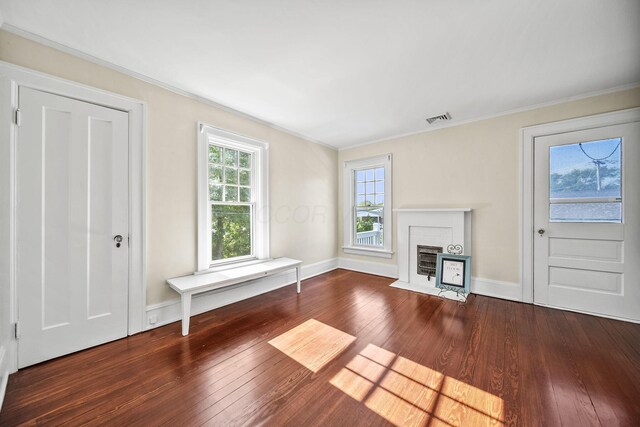 1812 Newark Granville Rd, Granville, OH 43023 - unfurnished living room with ornamental molding, hardwood / wood-style floors, baseboards, and a fireplace with flush hearth