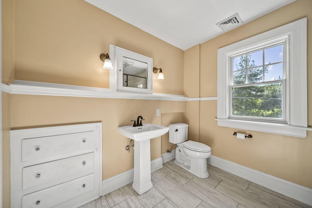 1812 Newark Granville Rd, Granville, OH 43023 - bathroom featuring baseboards and toilet
