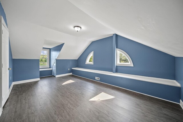 1812 Newark Granville Rd, Granville, OH 43023 - additional living space featuring wood finished floors, vaulted ceiling, and baseboards