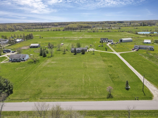 birds eye view of property featuring a rural view