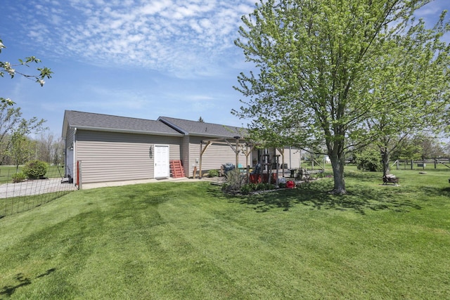 view of yard with fence