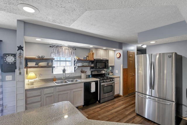 kitchen featuring open shelves, a sink, a textured ceiling, dark wood finished floors, and black appliances