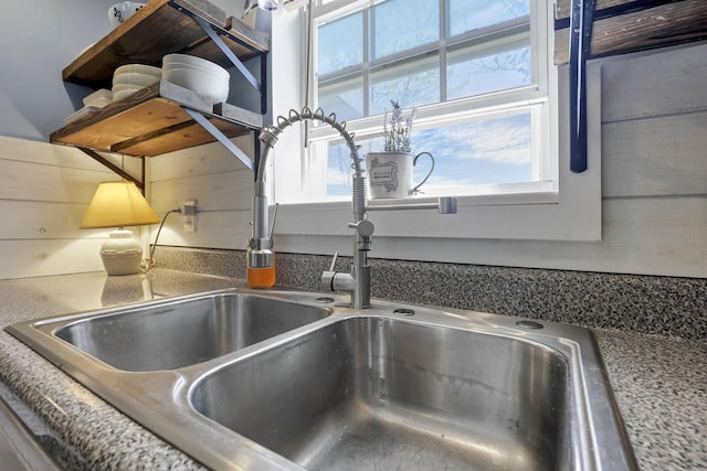 details with a sink and open shelves