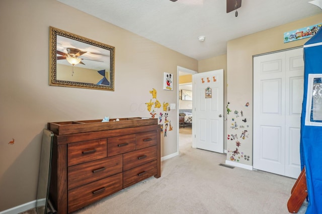 2128 Clay Stone Pl, Reynoldsburg, OH 43068 - bedroom featuring baseboards, visible vents, a ceiling fan, and light carpet