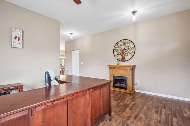 2128 Clay Stone Pl, Reynoldsburg, OH 43068 - office featuring dark wood-style floors, baseboards, and a glass covered fireplace