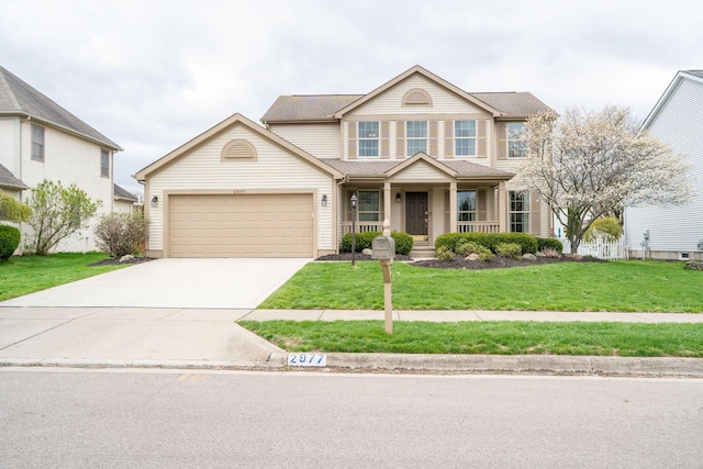 craftsman house featuring a porch, an attached garage, a front yard, and concrete driveway