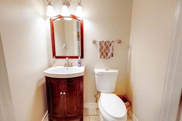 8028 Concord Rd, Johnstown, OH 43031 - bathroom featuring vanity, toilet, and baseboards