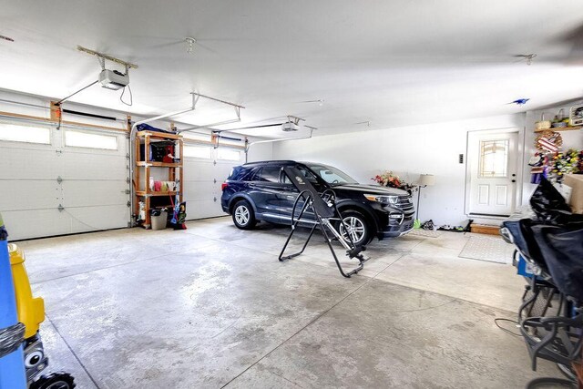 8028 Concord Rd, Johnstown, OH 43031 - garage featuring a garage door opener