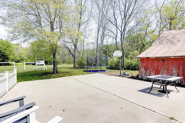 8028 Concord Rd, Johnstown, OH 43031 - view of patio / terrace with a trampoline and a playground