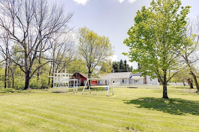 8028 Concord Rd, Johnstown, OH 43031 - view of grassy yard featuring a playground