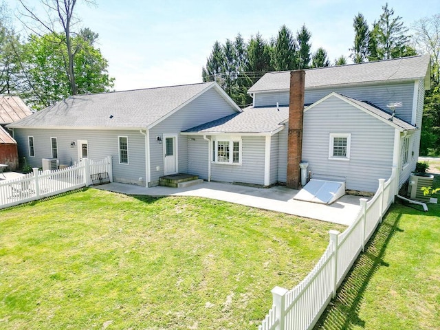 8028 Concord Rd, Johnstown, OH 43031 - rear view of house with a patio area, central AC, and a shingled roof