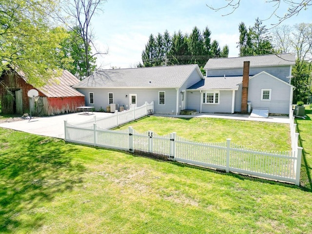 8028 Concord Rd, Johnstown, OH 43031 - rear view of property featuring a patio area, a gate, and central AC unit