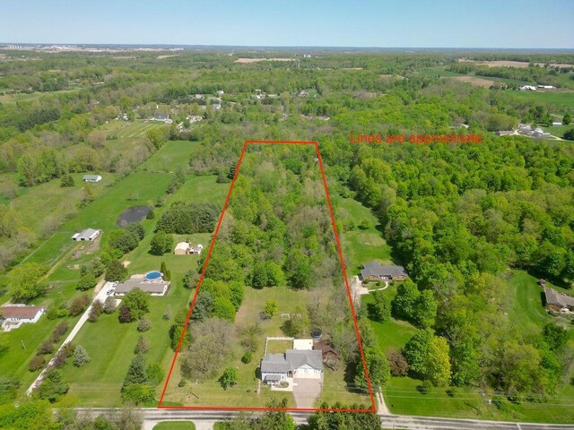 8028 Concord Rd, Johnstown, OH 43031 - aerial overview of property's location with a heavily wooded area and property parcel outlined