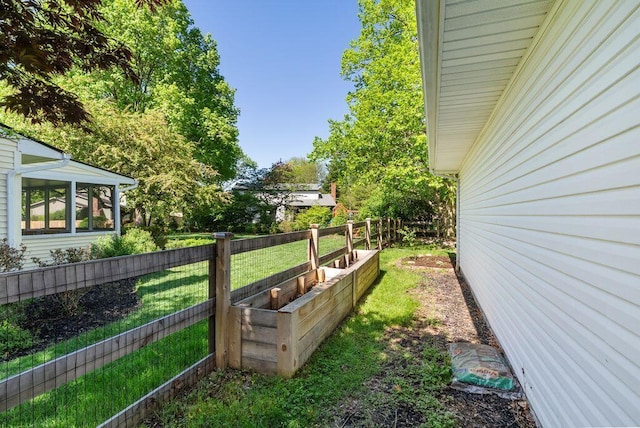 view of yard with fence