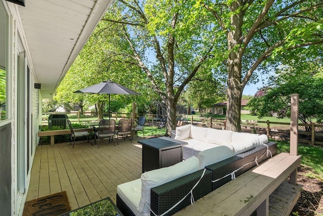 deck featuring an outdoor living space