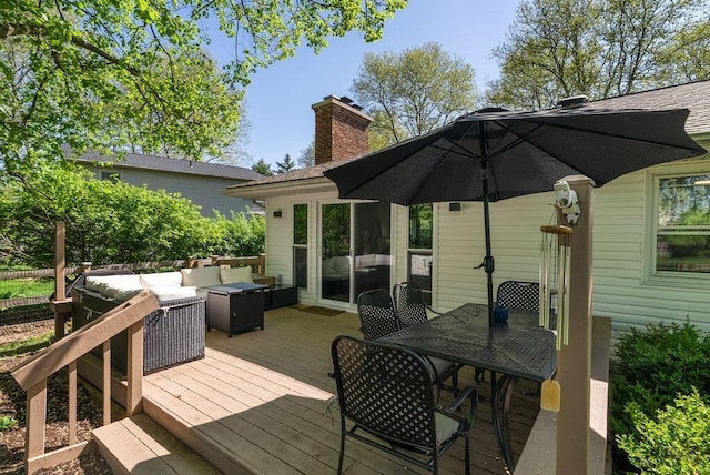 deck featuring an outdoor living space and outdoor dining area