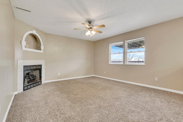 577 Stable St, Pataskala, OH 43062 - unfurnished living room featuring a ceiling fan, baseboards, carpet floors, and a fireplace