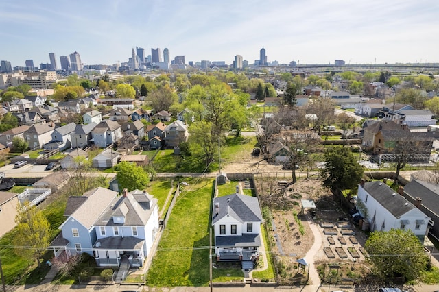 drone / aerial view featuring a residential view and a city view