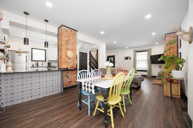 dining area featuring recessed lighting and dark wood finished floors