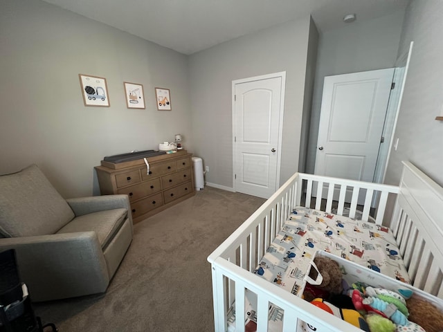 307 Shady Hollow Dr, Commercial Point, OH 43116 - bedroom featuring baseboards, carpet flooring, and a crib