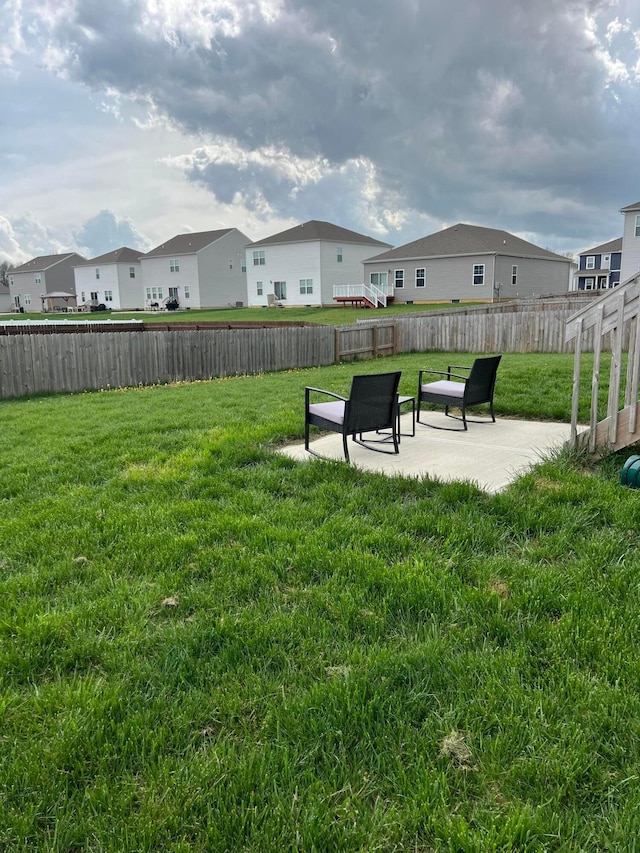 307 Shady Hollow Dr, Commercial Point, OH 43116 - view of yard with a fenced backyard, a residential view, and a patio