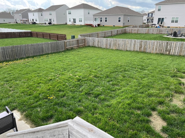 307 Shady Hollow Dr, Commercial Point, OH 43116 - view of yard with a fenced backyard and a residential view