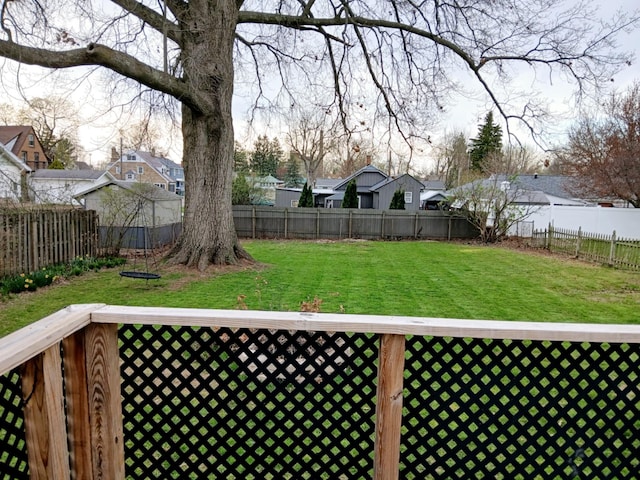 view of yard with a residential view and fence