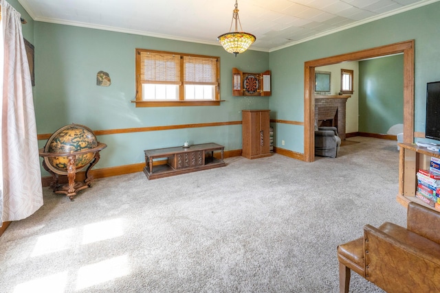 317 N High St, New Lexington, OH 43764 - living area featuring ornamental molding, carpet, a brick fireplace, and baseboards
