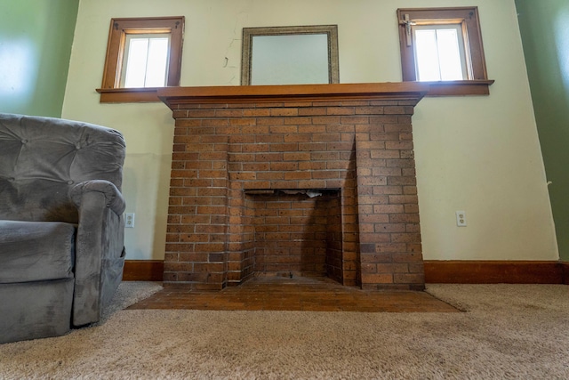 317 N High St, New Lexington, OH 43764 - carpeted living room with healthy amount of natural light and baseboards