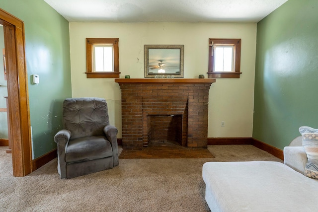 317 N High St, New Lexington, OH 43764 - carpeted living area with a fireplace and baseboards