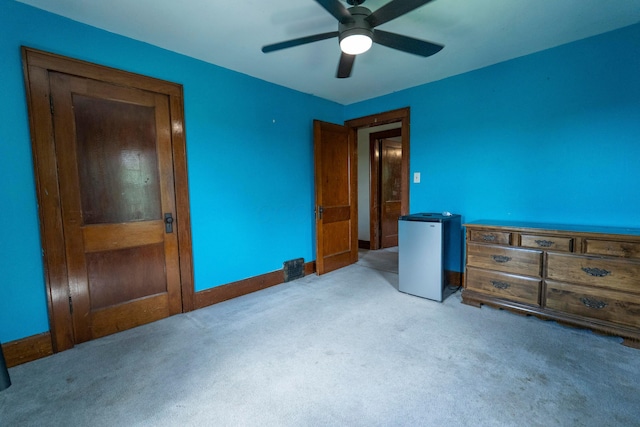 317 N High St, New Lexington, OH 43764 - unfurnished bedroom featuring carpet flooring, a ceiling fan, and baseboards
