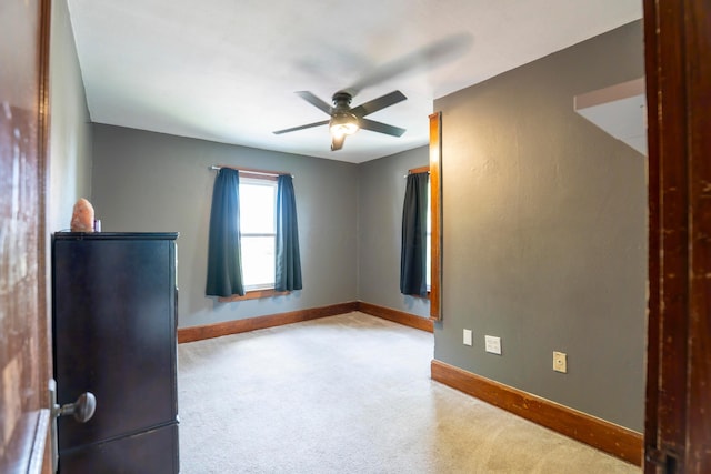 317 N High St, New Lexington, OH 43764 - unfurnished room with baseboards and a ceiling fan