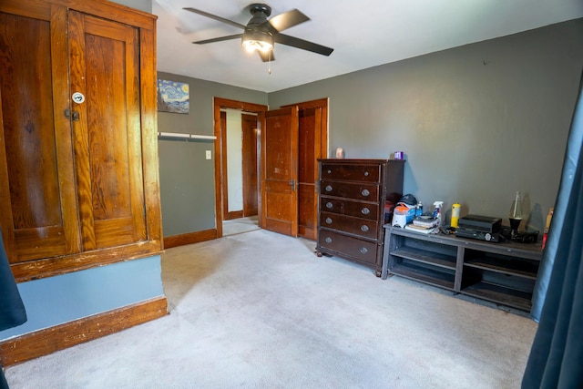 317 N High St, New Lexington, OH 43764 - carpeted bedroom with ceiling fan and baseboards