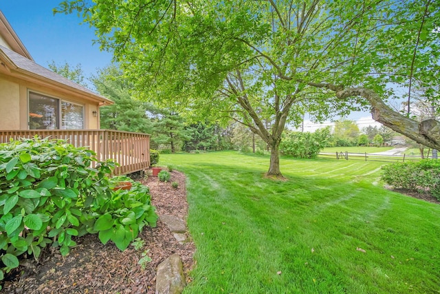 6180 Storm Haven Ct, Lewis Center, OH 43035 - view of green lawn with a deck