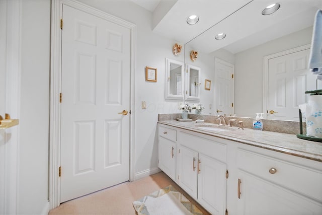 6180 Storm Haven Ct, Lewis Center, OH 43035 - bathroom featuring vanity, baseboards, and recessed lighting