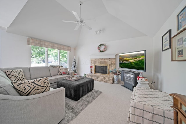 6180 Storm Haven Ct, Lewis Center, OH 43035 - living room with ceiling fan, a brick fireplace, carpet flooring, and high vaulted ceiling
