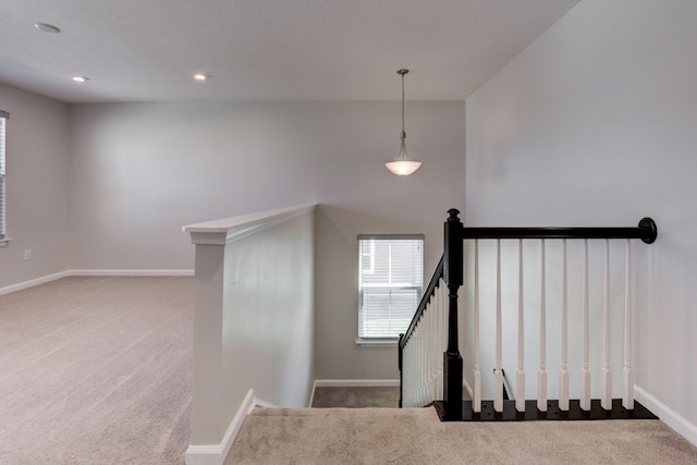 stairs featuring baseboards, carpet flooring, and recessed lighting