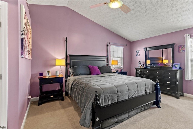 bedroom with baseboards, carpet, and vaulted ceiling