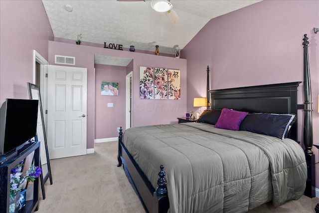 bedroom featuring lofted ceiling, baseboards, ceiling fan, visible vents, and light carpet